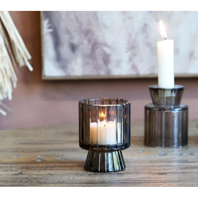 Photophore en verre moka avec chandelle et chauffe-plat allumées
