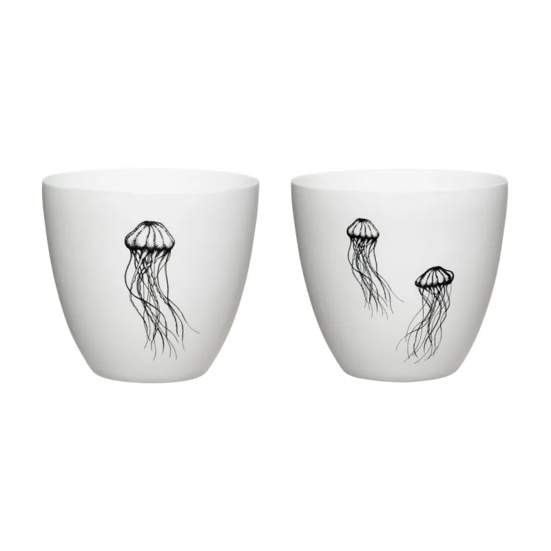 Vue avant de deux photophores en porcelaine avec impression méduse.